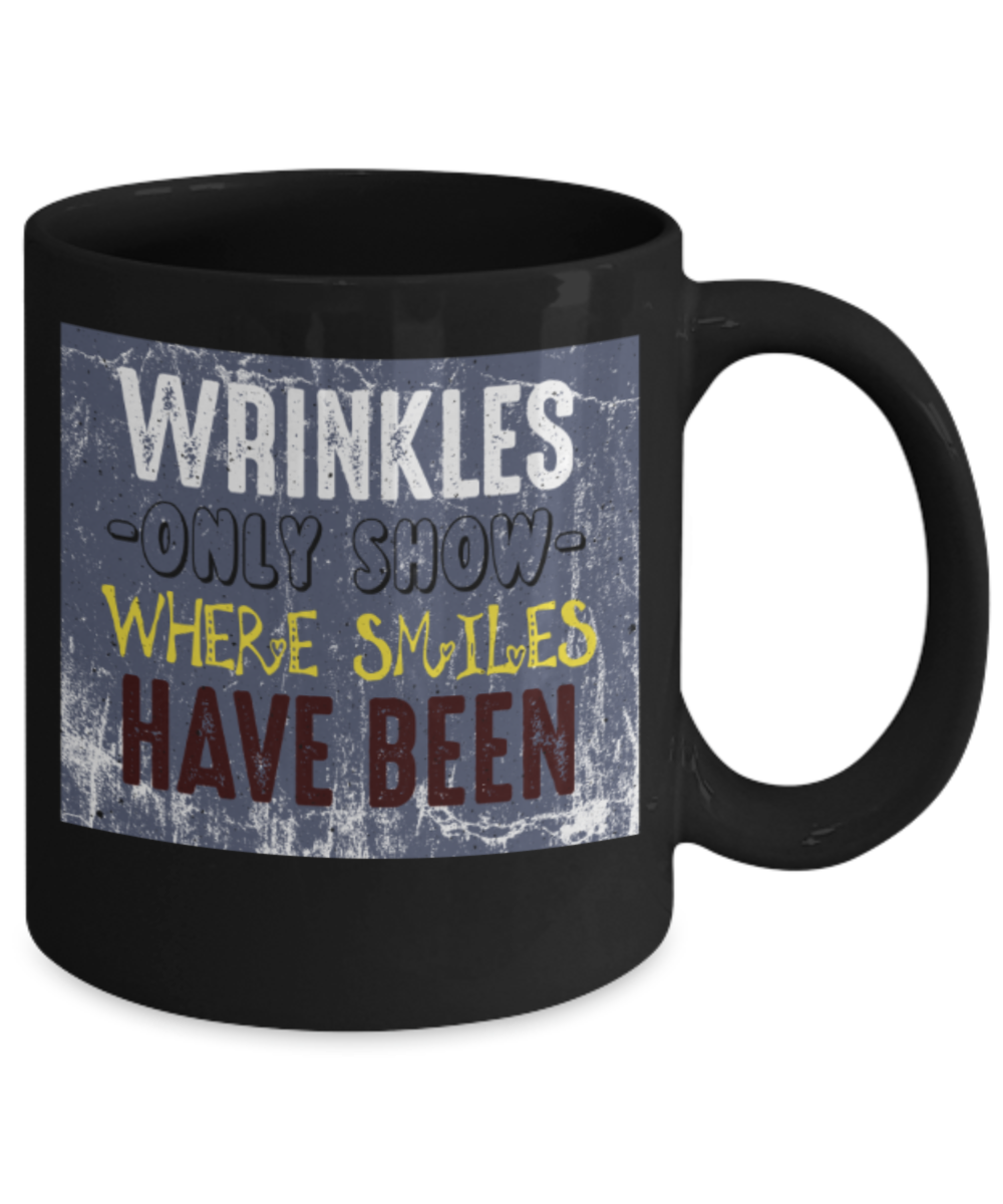 Wrinkles only show where smiles have been - Funny Black Porcelain Coffee 11 oz