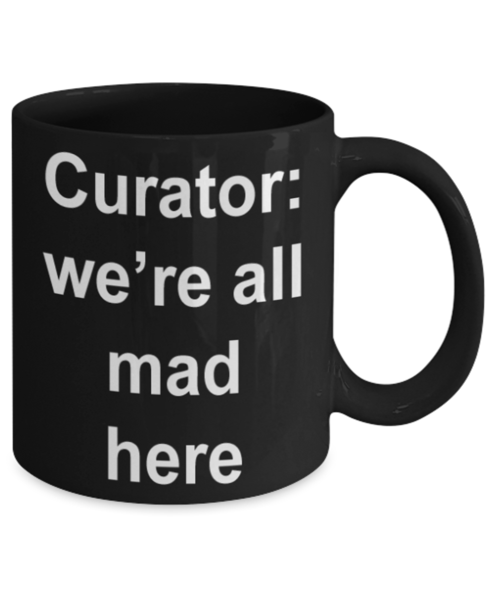Curator gifts mugs, Curator we're all mad here - Funny Black Porcelain Coffee Mug Cute Ceramic Cup 11 oz
