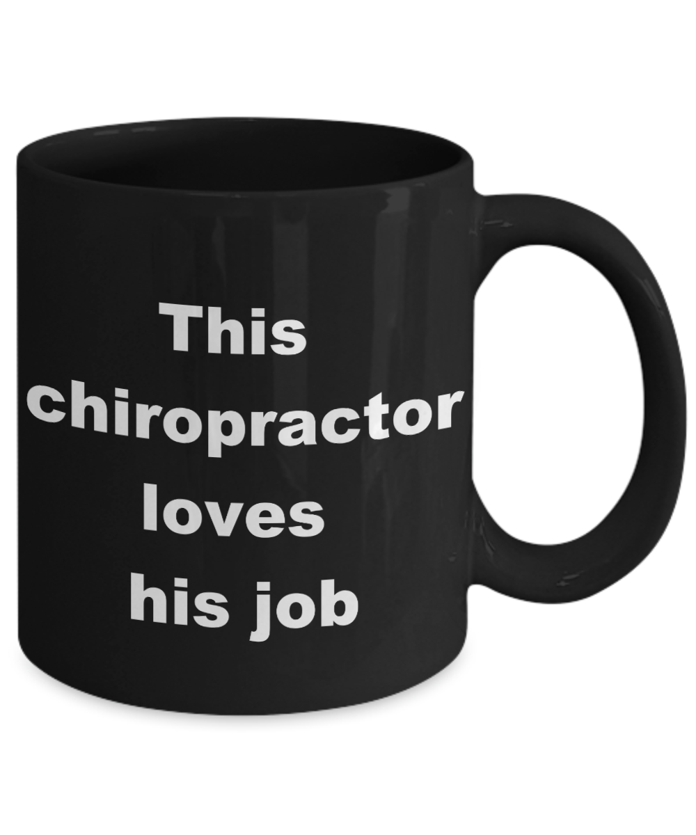 Chiropractor Coffee mug,This chiropractor loves his job-Black Coffee Mug 11 oz