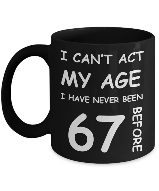 67th Birthday Gift for Women & Men - I can't act my Age, I have never been 67 Before - Black Porcelain Coffee 11 oz for Ladies & Gents - Born In 1953