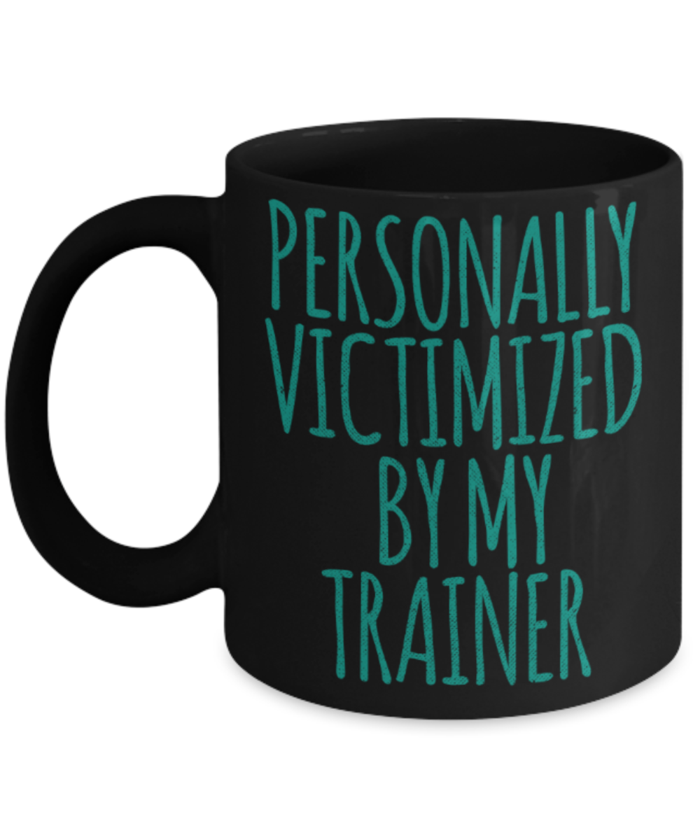 Traning lovers mugs, Personally victimized by my Trainer - Funny Black Porcelain Coffee 11 oz