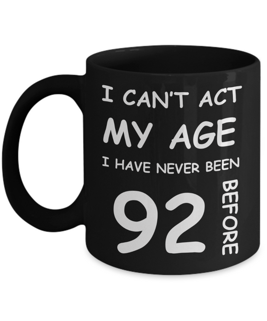 92nd Birthday Gift for Women & Men - I can't act my Age, I have never been 92 Before - Black Porcelain Coffee 11 oz for Ladies & Gents - Born In 1928