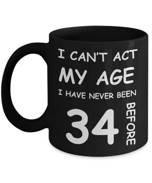 34th Birthday Gift for Women & Men - I can't act my Age, I have never been 34 Before - Black Porcelain Coffee 11 oz for Ladies & Gents - Born In 1986