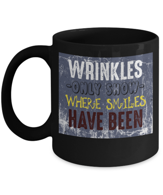 Wrinkles only show where smiles have been - Funny Black Porcelain Coffee 11 oz