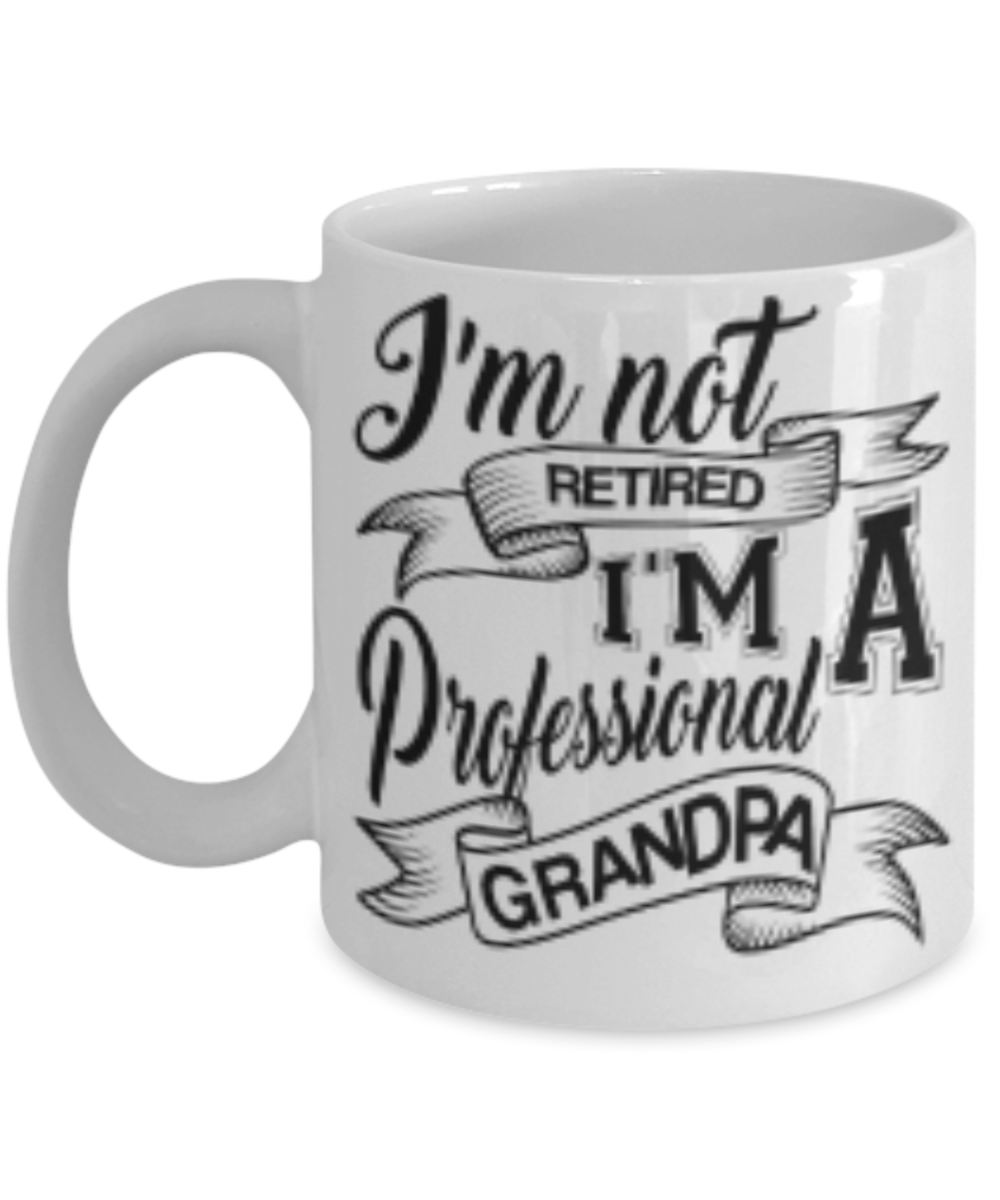 I'm not RETIRED..I'm A Professional GRANDPA Coffee Cup - Premium 11 oz White coffee cup