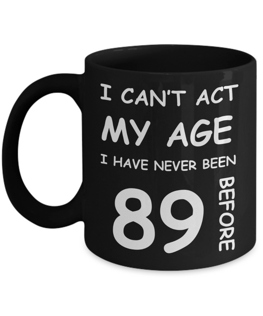 89th Birthday Gift for Women & Men - I can't act my Age, I have never been 89 Before - Black Porcelain Coffee 11 oz for Ladies & Gents - Born In 1931