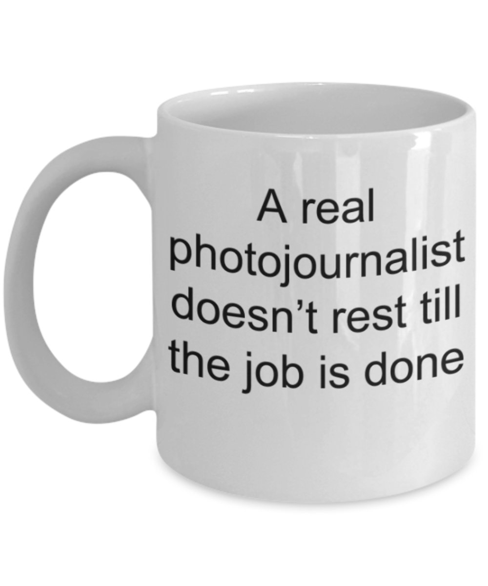 Photojournalist gifts mugs, A real photojournalist doesn't rest till the job is done - Funny White Porcelain Coffee Mug Cute Ceramic Cup 11 oz